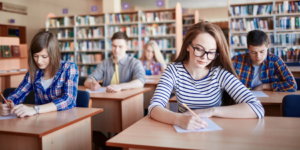 students writing an exam
