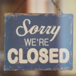 Business with Closed Sign