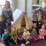Dunstable Students & Mrs. F with the Trappers Tent 2025 (3)